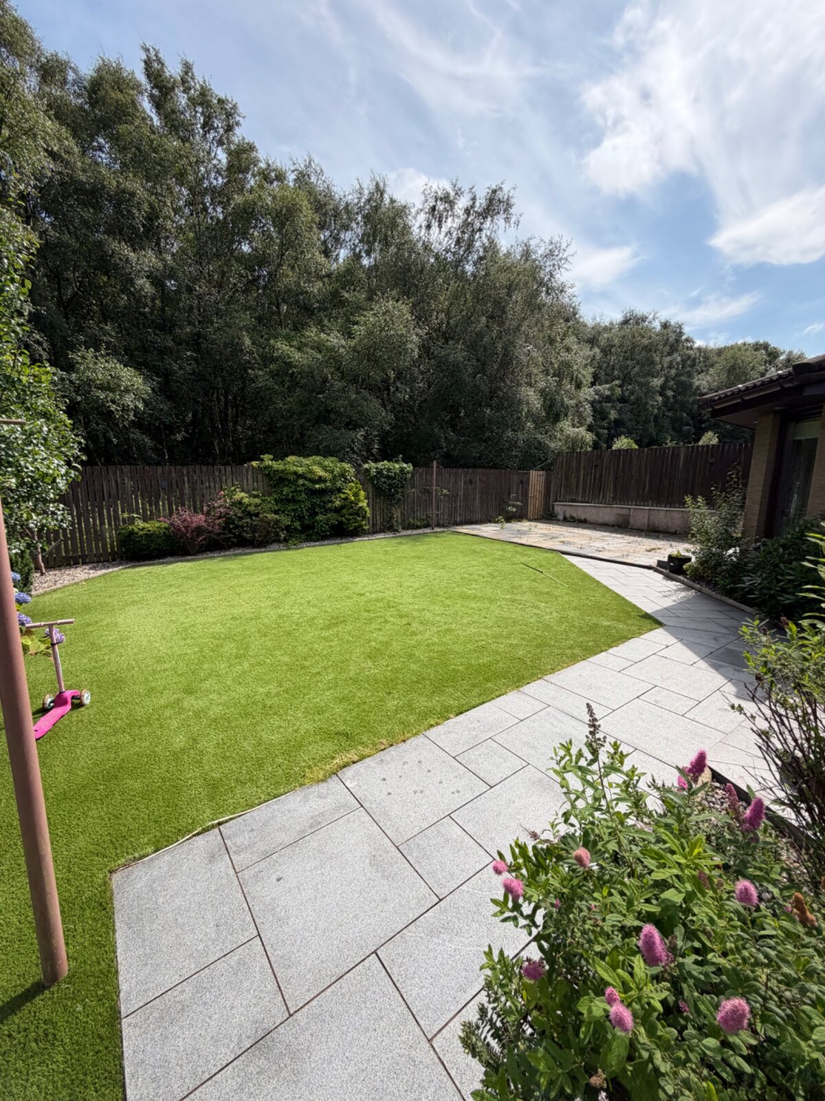 Lawn and paved terrace